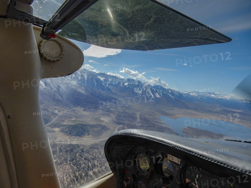View of lake and mountains from cockpit