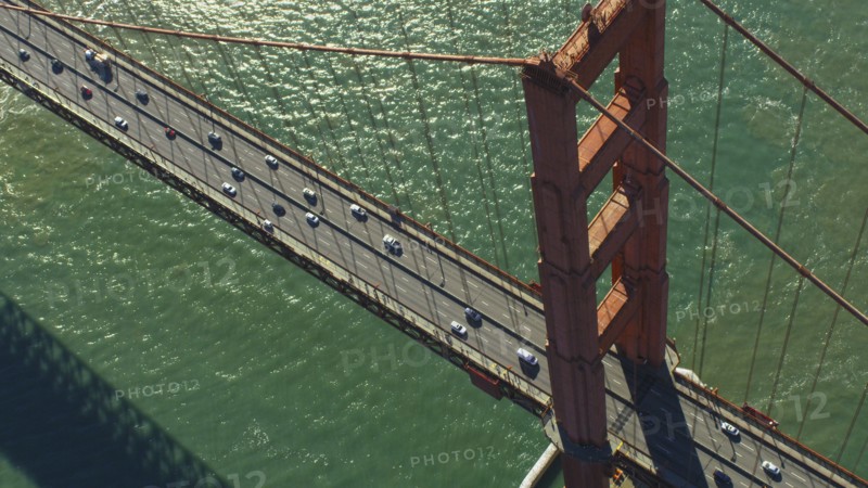 Aerial view of cars driving on bridge