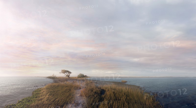 Aerial view of dirt path over lakes in rural landscape