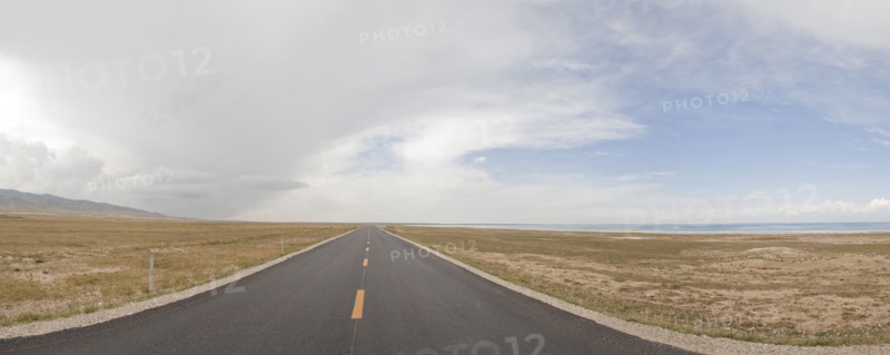 Empty road in rural landscape