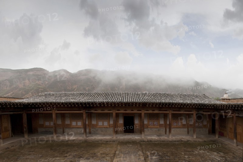 Remote monastery and cloudy sky