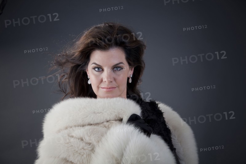 Caucasian woman wearing fur coat