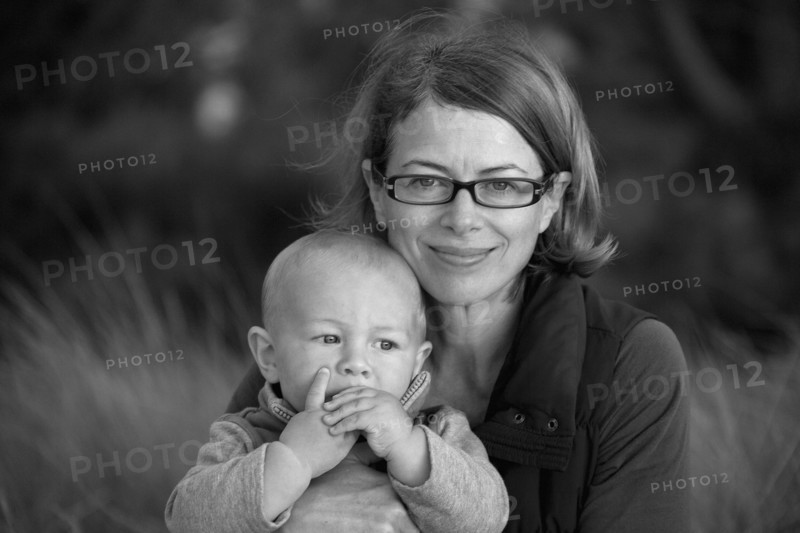 Portrait of smiling Caucasian mother holding baby son