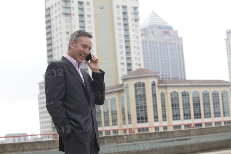 Caucasian businessman talking on cell phone