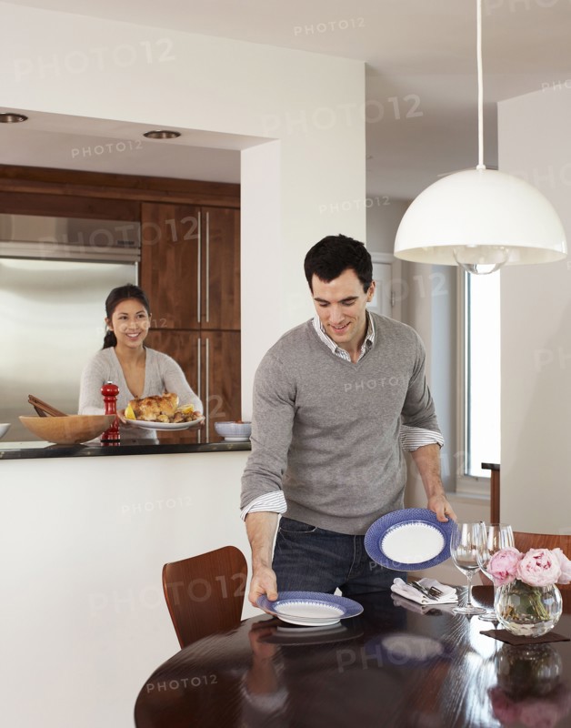 Couple preparing dinner together