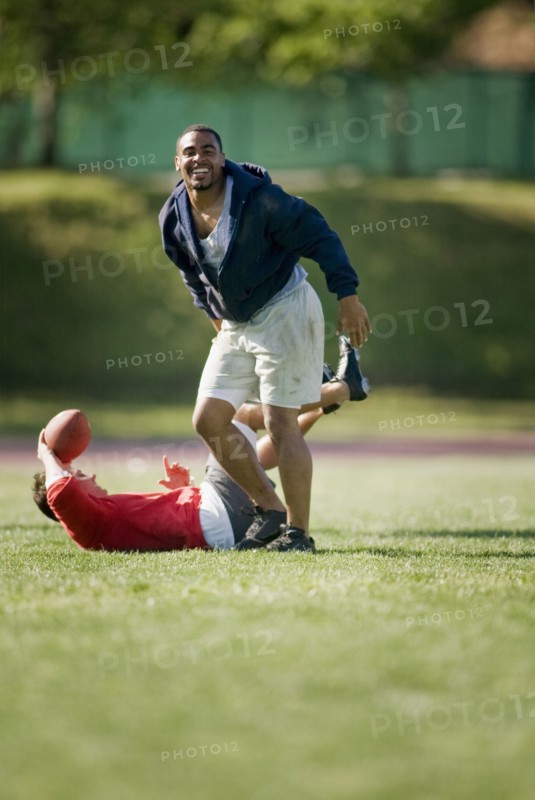 Men playing football