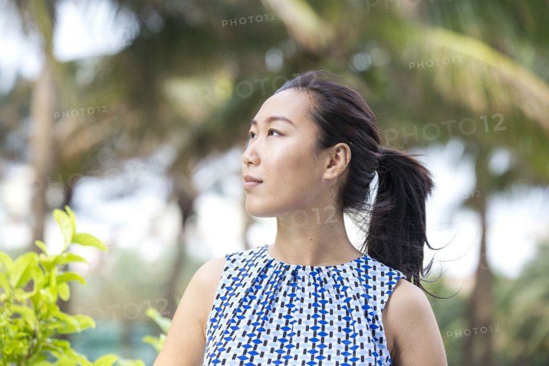 Asian businesswoman smiling outdoors