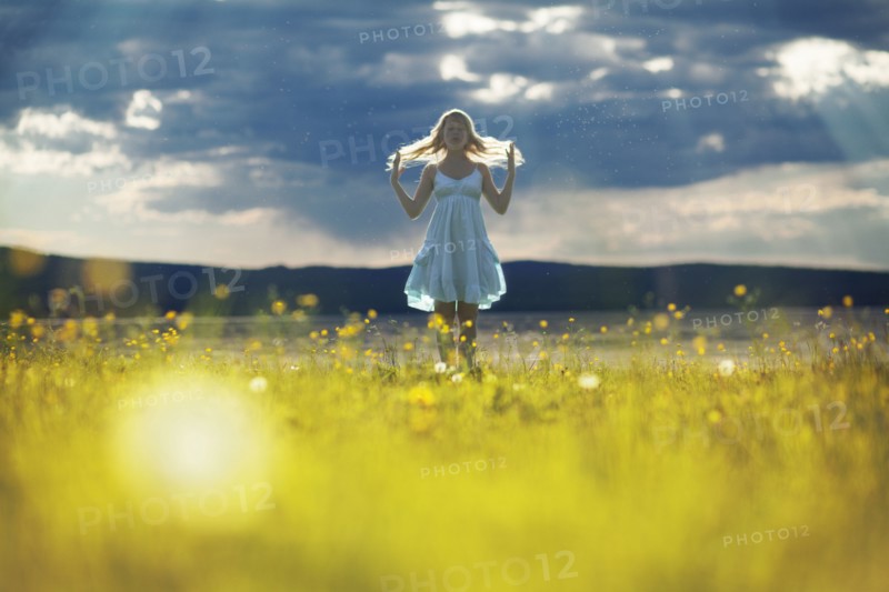 Caucasian woman walking in rural field