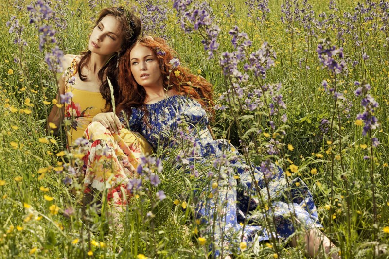 Caucasian women in field of flowers