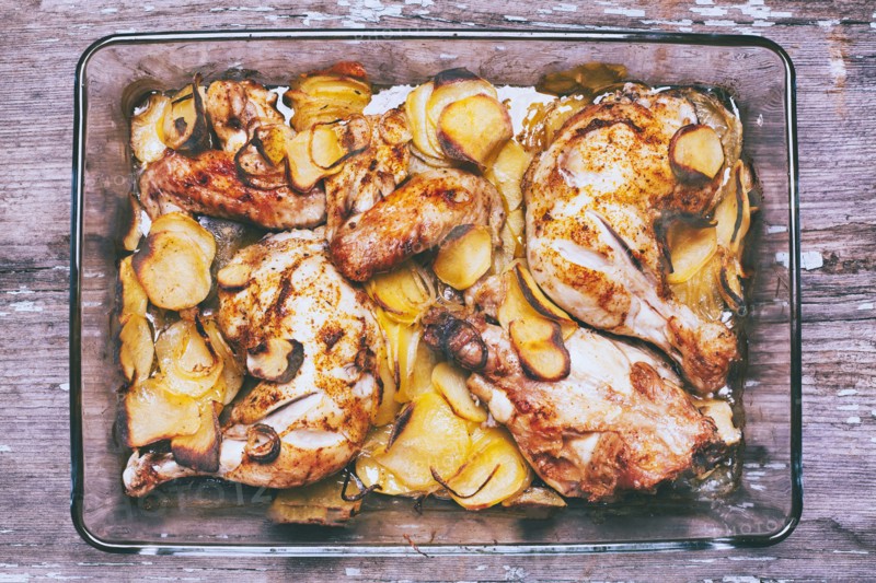 Potato and chicken casserole in baking dish