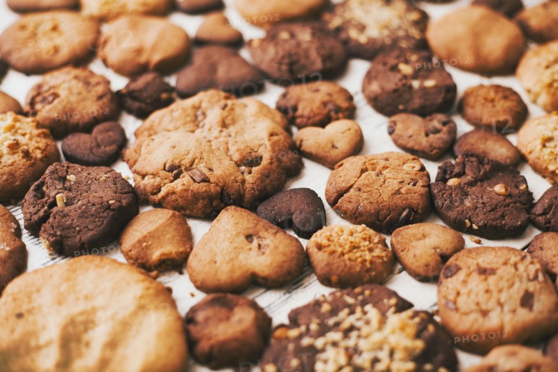 Variety of cookies on wooden table
