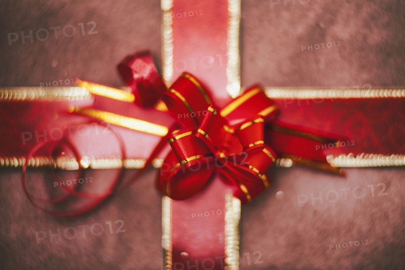 Close up of red bow on Christmas gift