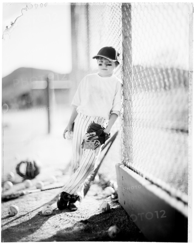 Caucasian baseball player standing on field