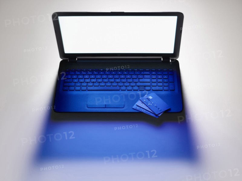 Credit cards on laptop computer