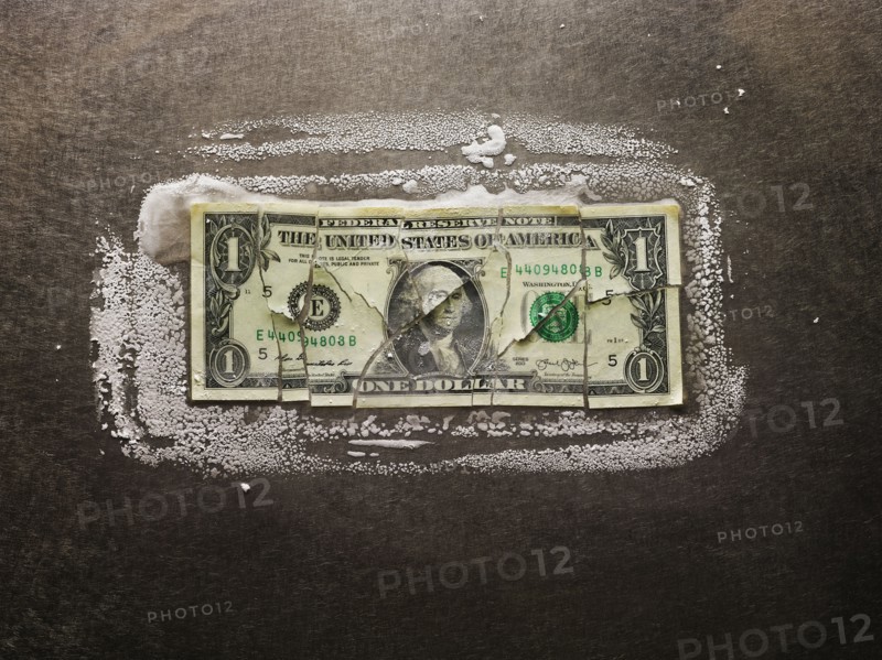 Frozen broken dollar bill
