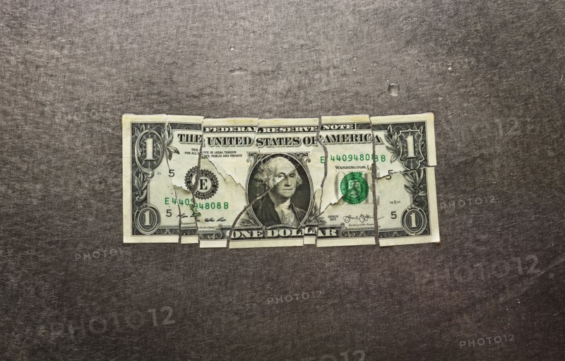 Broken dollar bill