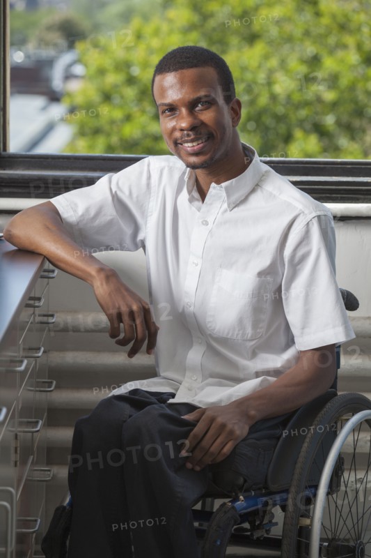 African American paraplegic man smiling
