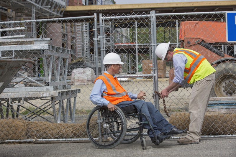 Caucasian engineers working on construction site
