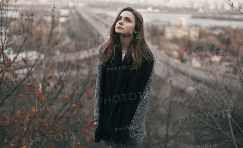 Caucasian woman looking up outdoors