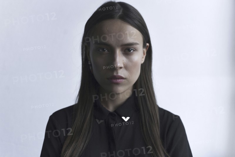 Portrait of serious Caucasian woman