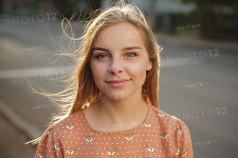 Wind blowing hair of Caucasian woman