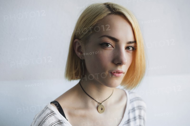 Portrait of serious Caucasian woman with short hair