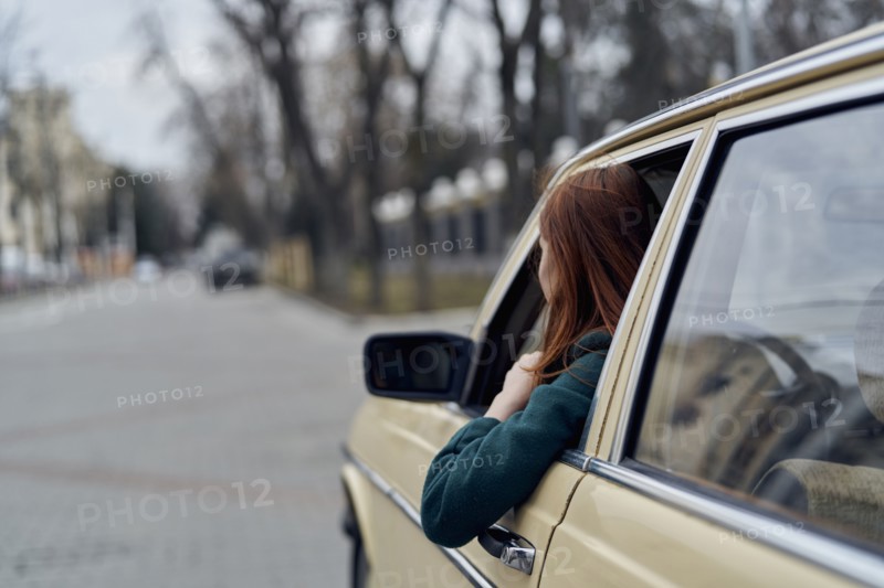 Caucasian woman driving car