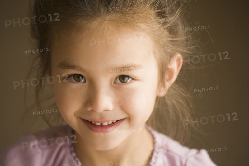 Close up of Asian girl smiling