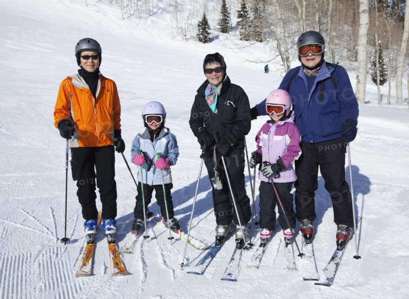 Family preparing to go skiing