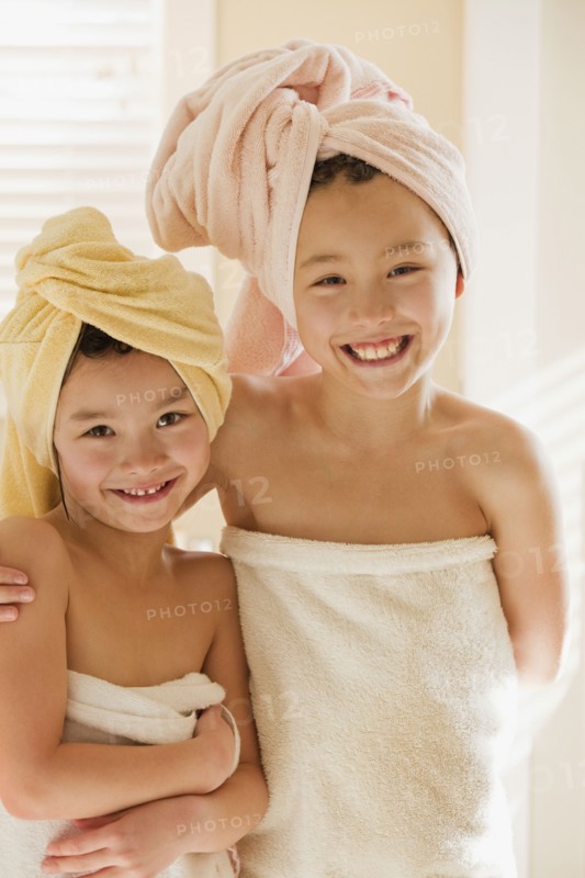 Girls wrapped in towels