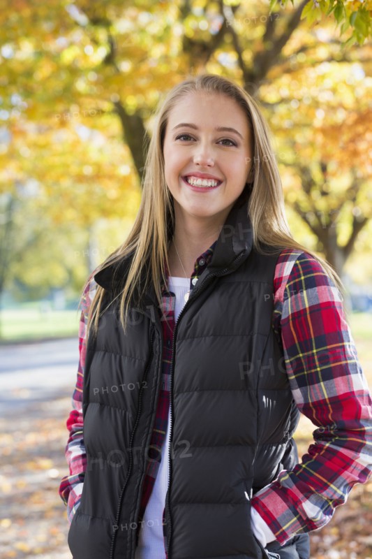 Caucasian woman smiling in park