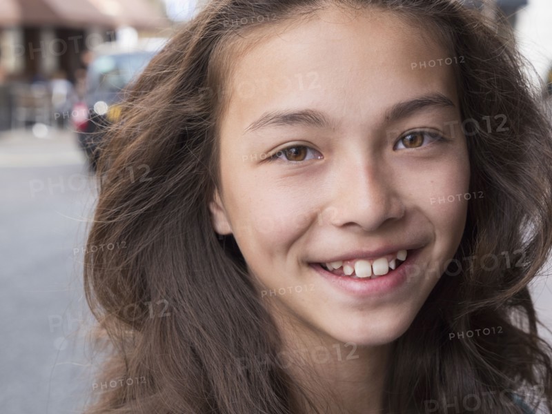 Close up of mixed race girl smiling