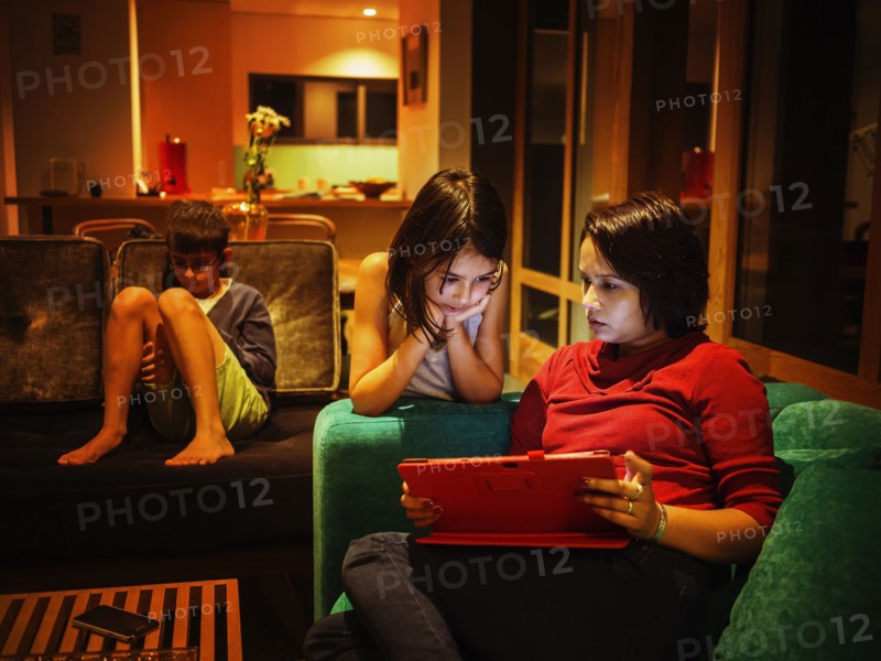 Family relaxing together in living room