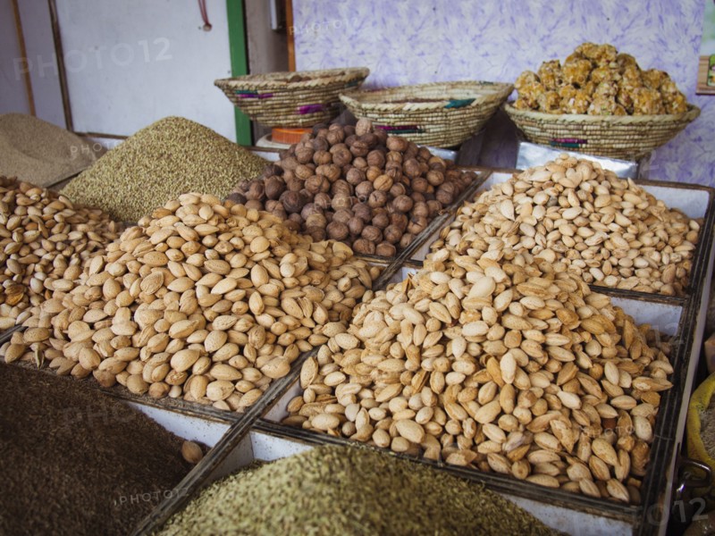 Bins of nuts and grains for sale in market