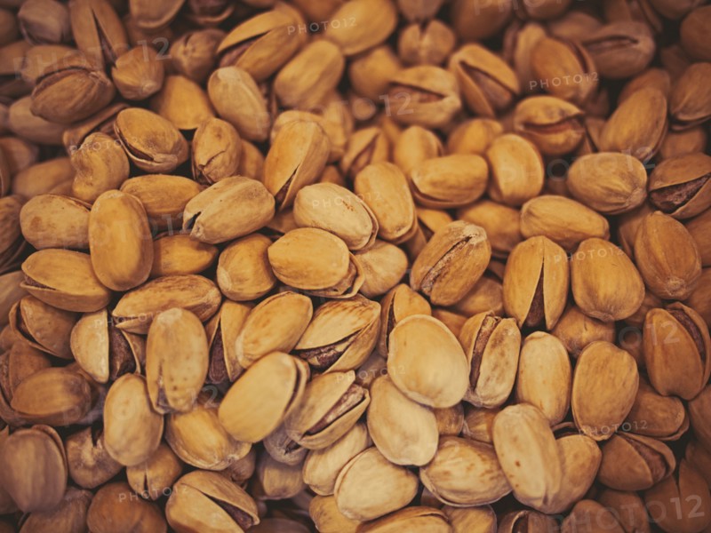 Close up of pile of pistachios