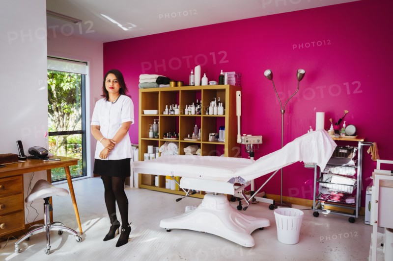 Mixed race technician working in home beauty parlor
