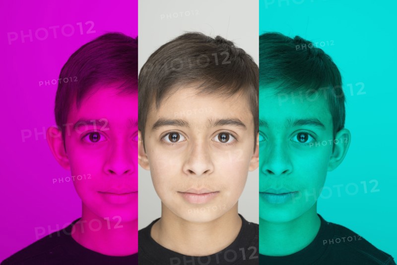 Mixed race boy in color shift