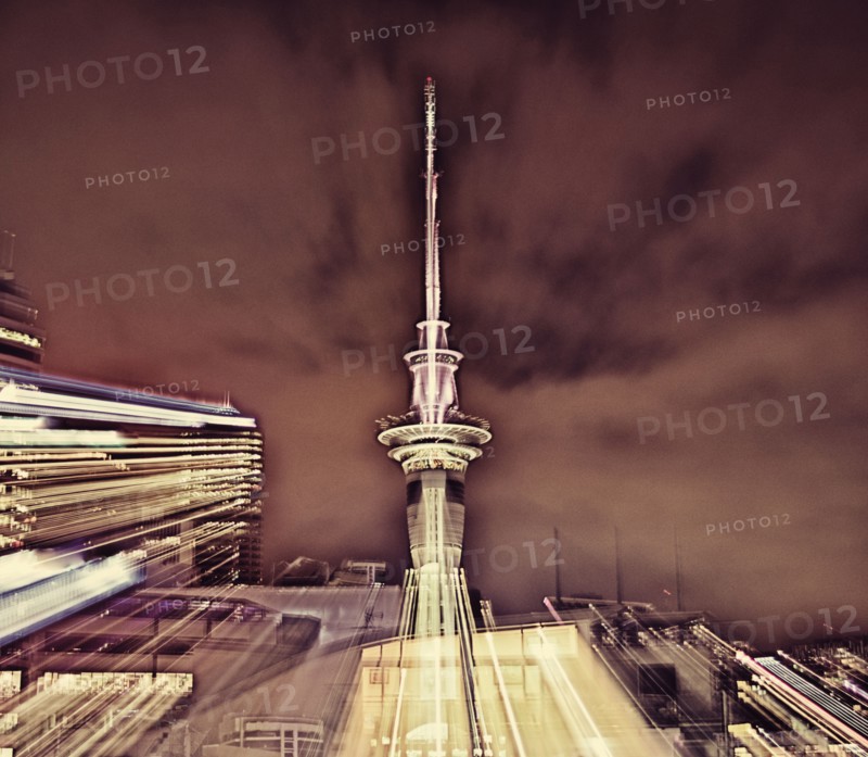 Double exposure of cityscape and cloudy sky
