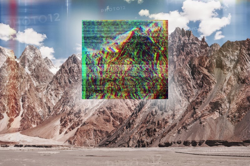 Glitch effect on mountain landscape
