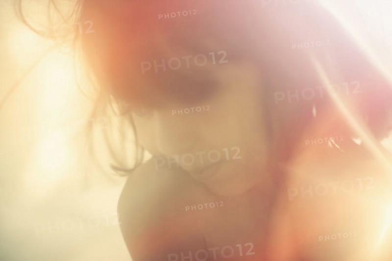 Sunbeams on Mixed Race girl