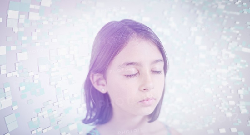 Pixels hovering near face of Mixed Race girl