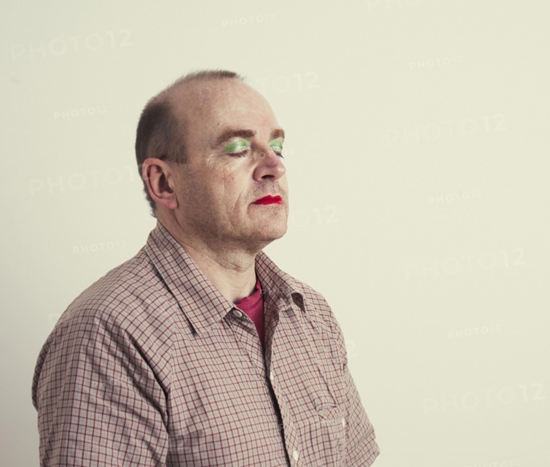 Caucasian man wearing makeup
