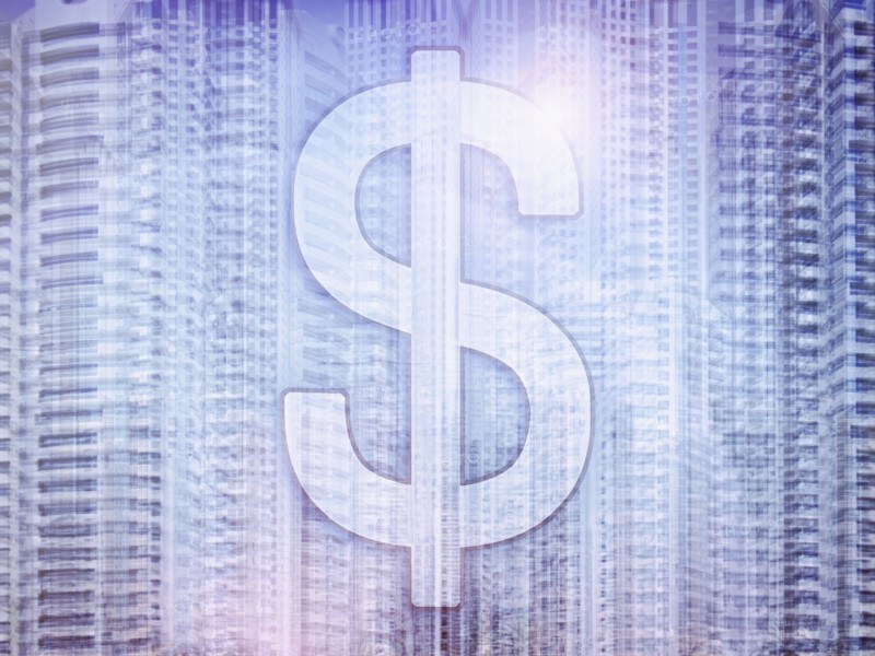 Dollar sign on highrise buildings