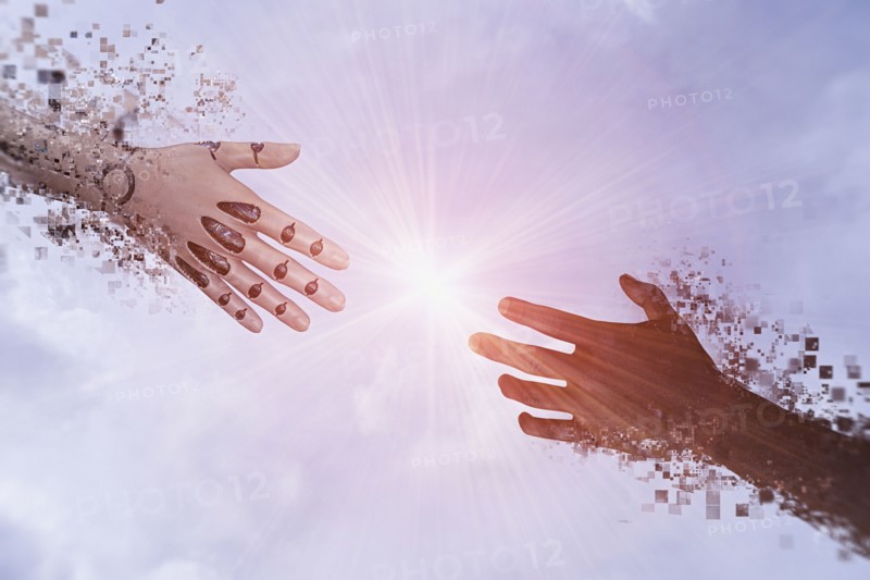 Pixelated robot hands reaching in sky