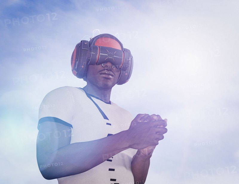Strong man wearing virtual reality helmet