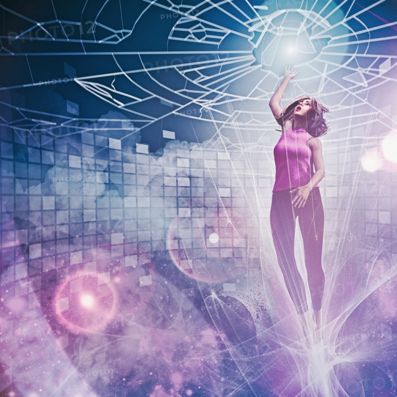 Businesswoman breaking through glass ceiling