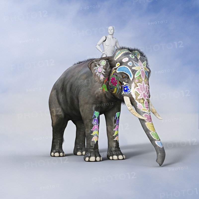 Robot man riding painted elephant