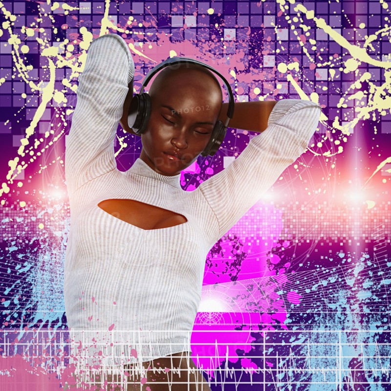 Woman listening and dancing to headphones