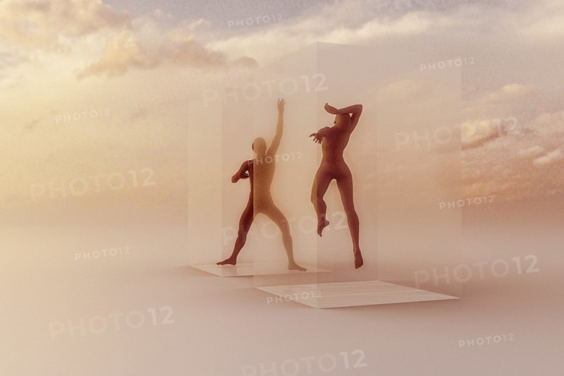 Dancers in suspended animation in clouds