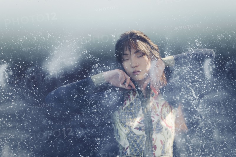 Droplets splashing near woman